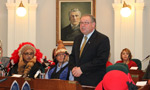 Premier Darrell Dexter, Minister of Aboriginal Affairs, speaks during Treaty Day ceremonies in Province House as National Chief Shawn Atleo, Assembly of First Nations and Chief Gerard Julian, co-chair, Assembly of Mi’kmaq Chiefs, look on.