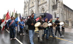 Mi'kmaw drummers march from St. Mary's Basilica during Treaty Day celebrations.